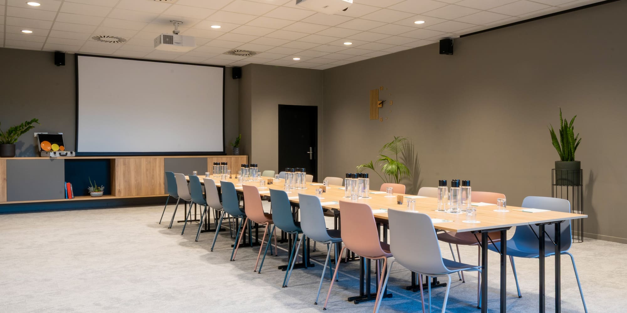 a room with a table and chairs