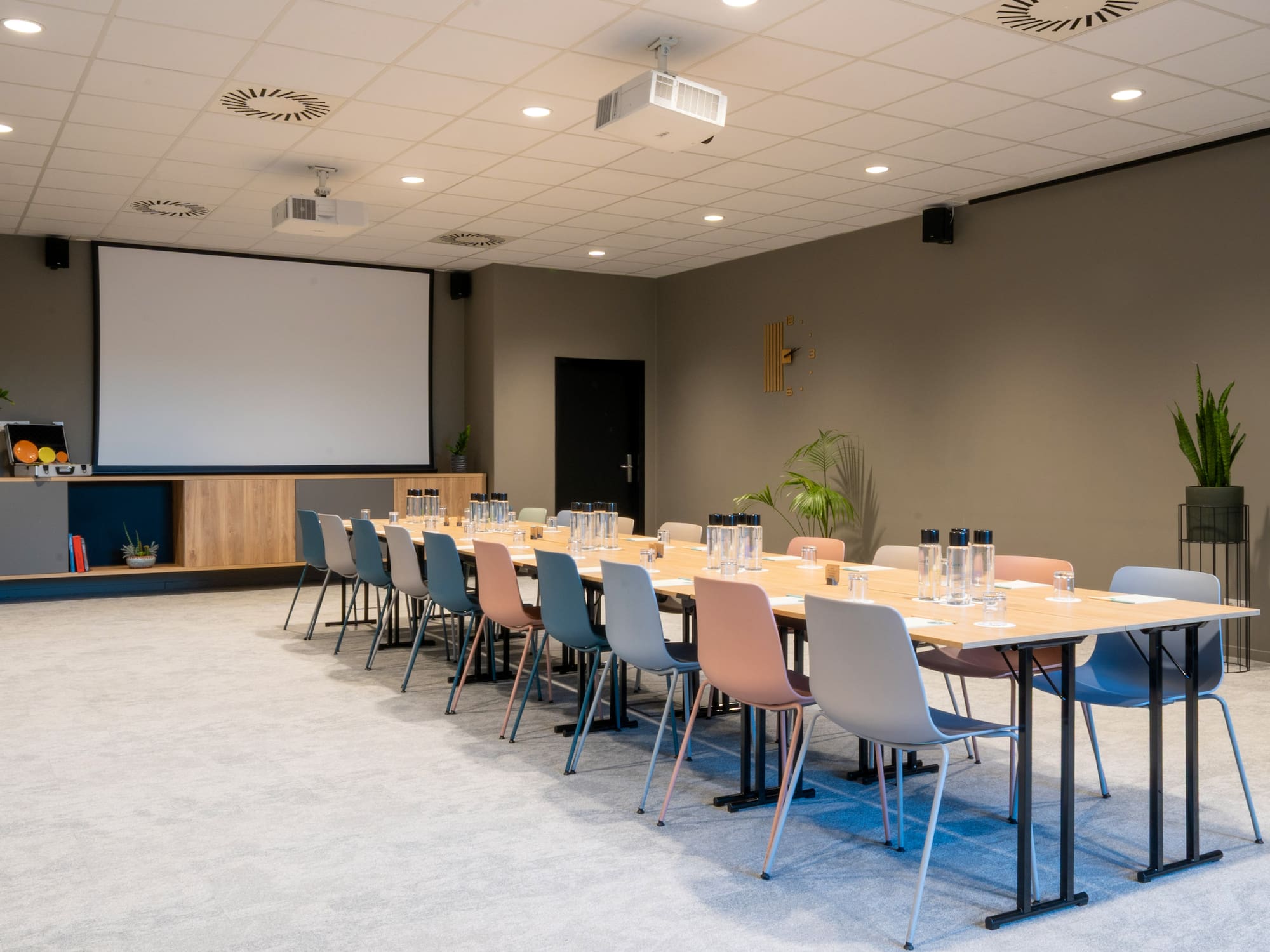 a room with a table and chairs