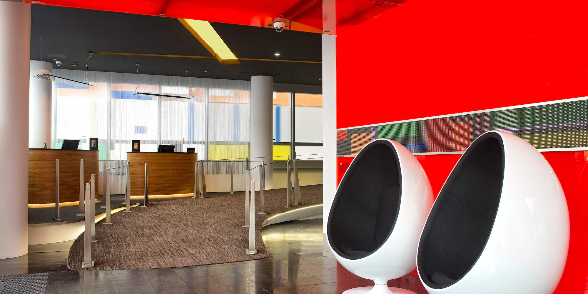 a two white chairs in a room