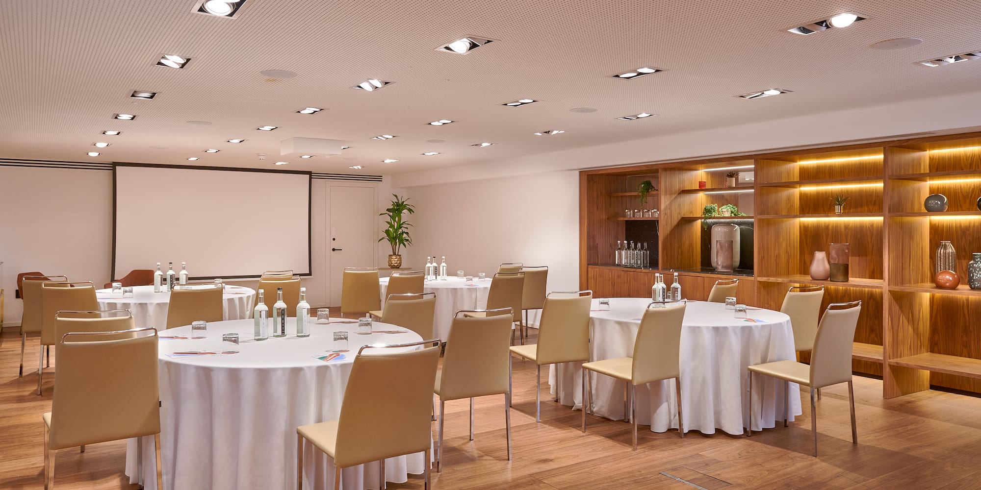 a room with tables and chairs