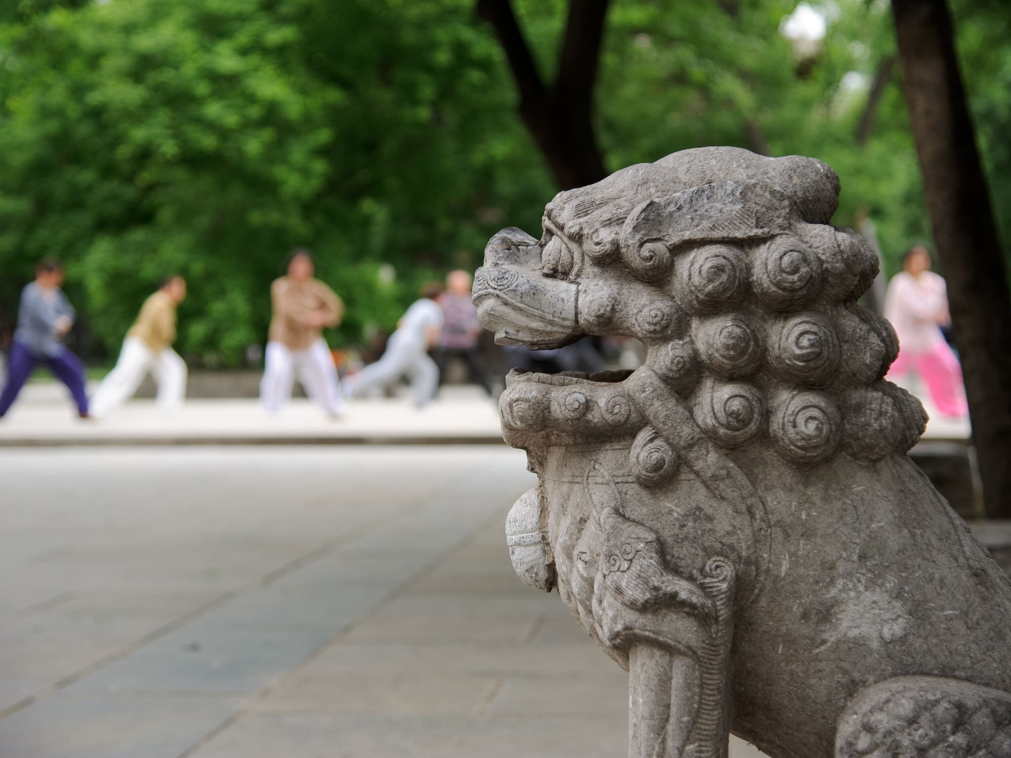 a stone statue of a lion
