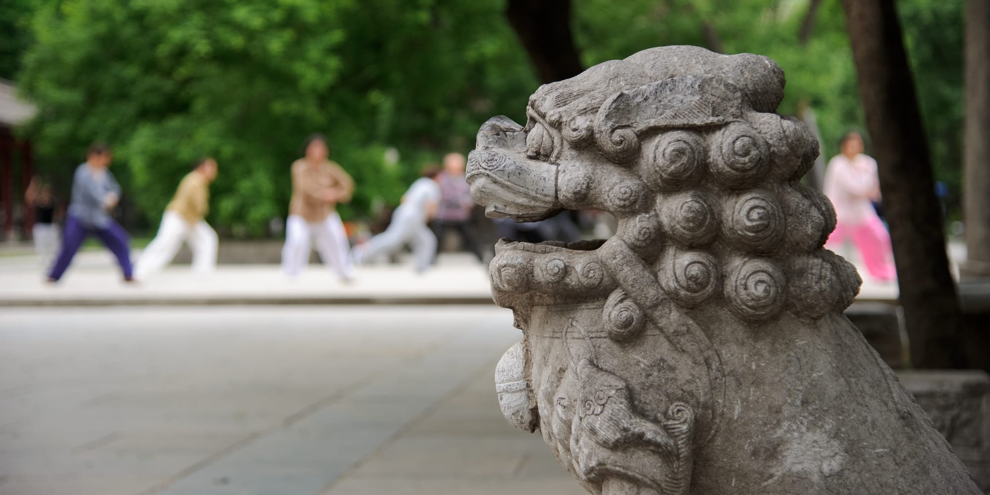 a stone statue of a lion