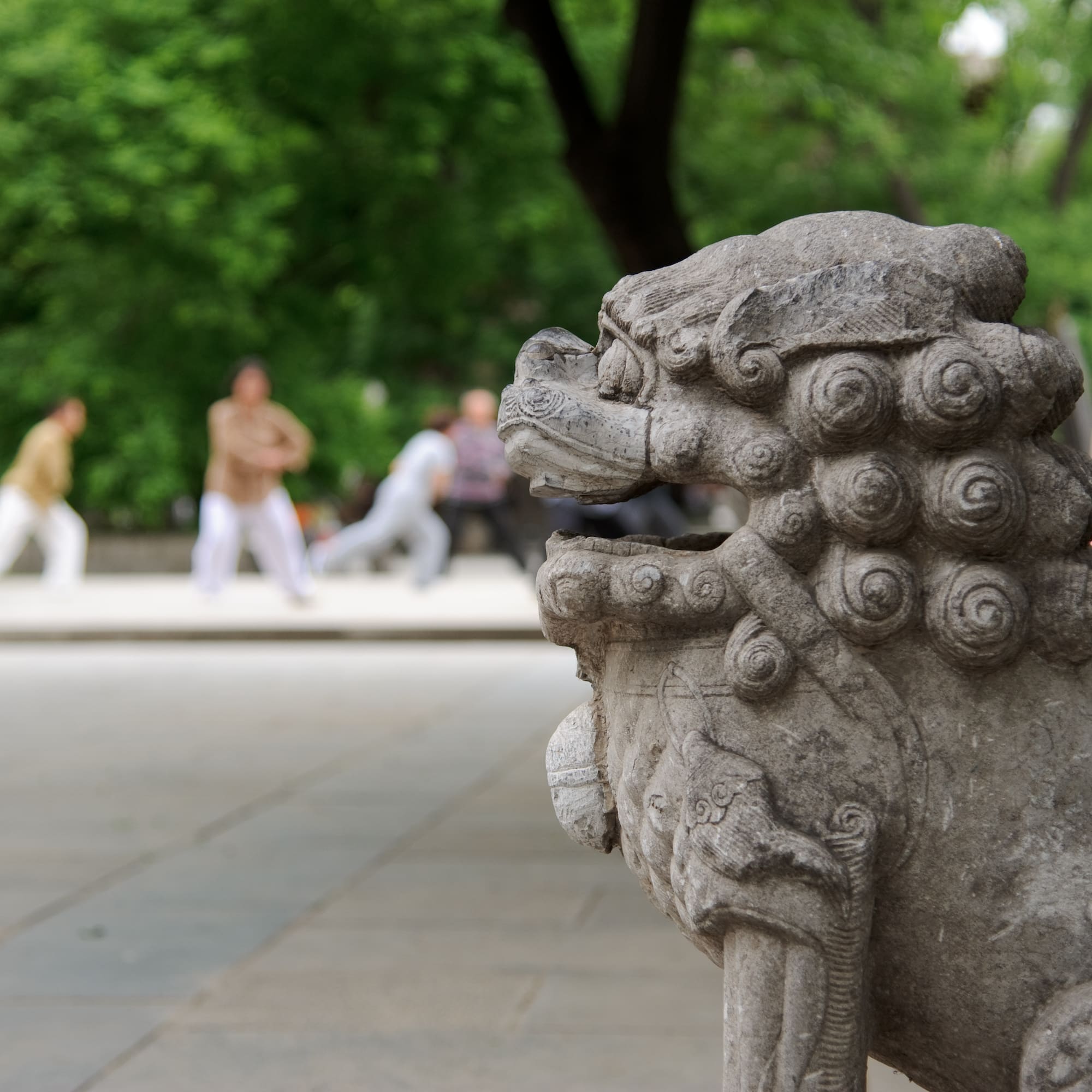 a stone statue of a lion