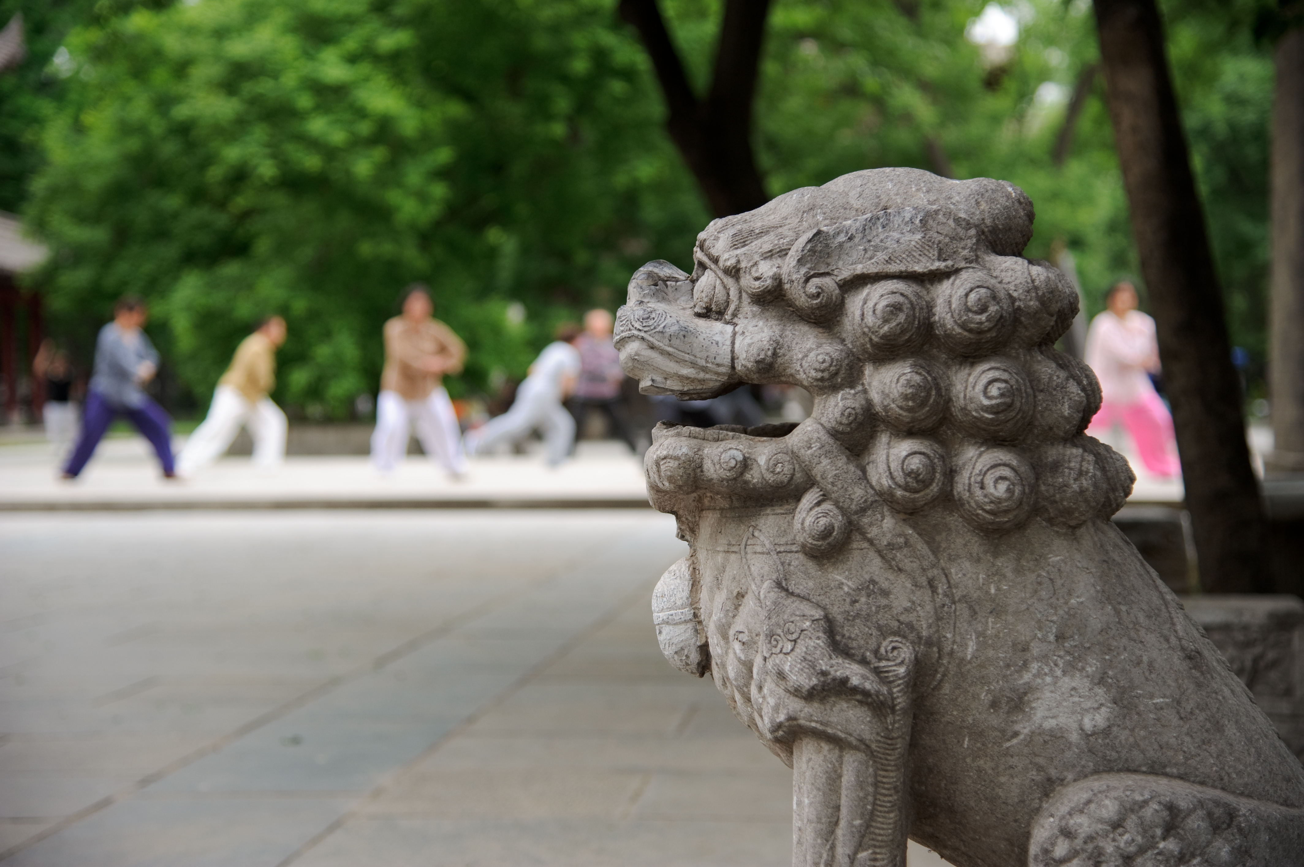 a stone statue of a lion