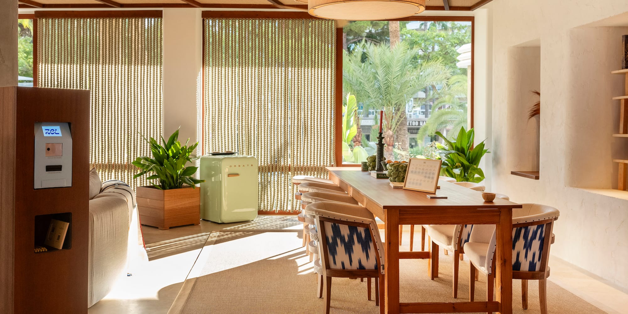 a room with a table and chairs