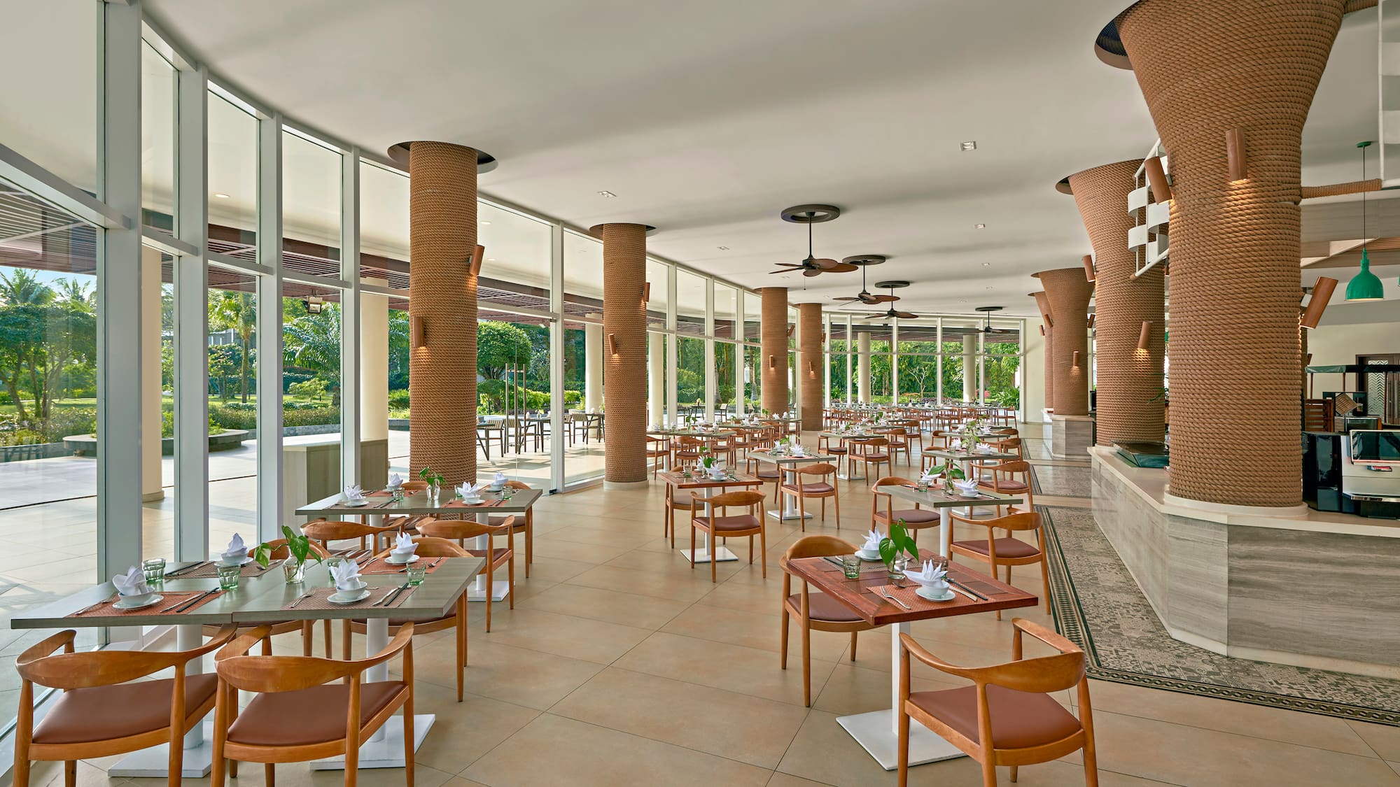 a restaurant with tables and chairs