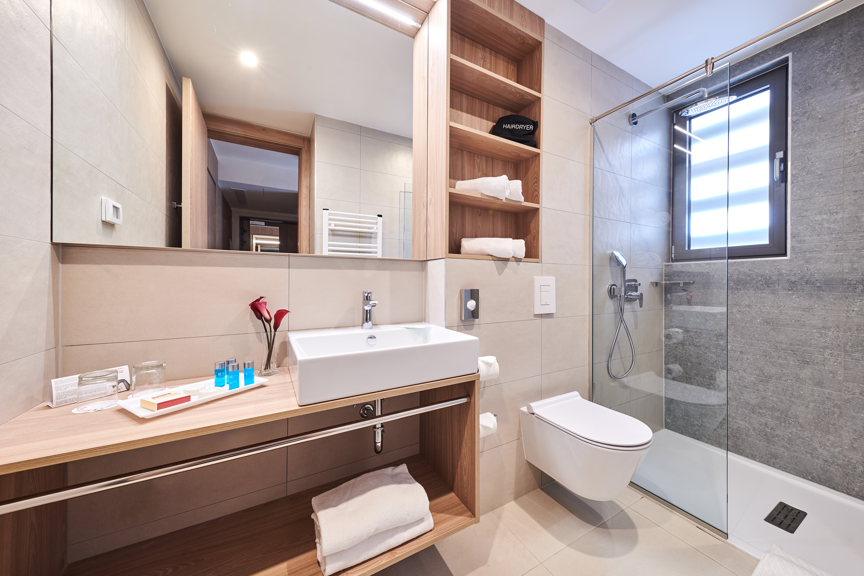 a bathroom with a glass shower and sink - Family Room - Garden Suites Umag Plava Laguna Affiliated by Meliá, Umag
