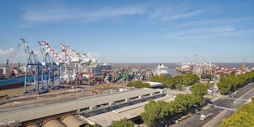 a large port with cranes and buildings