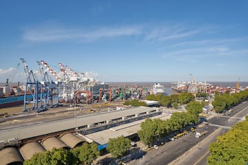 a large port with cranes and buildings