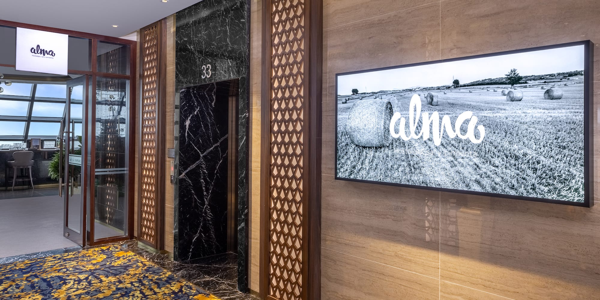 a tv on the wall of a building