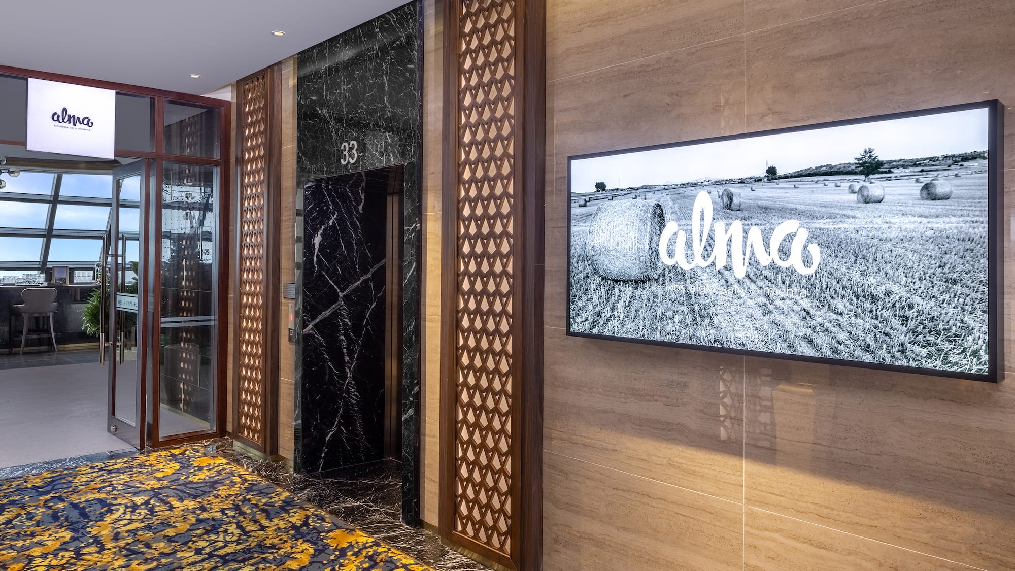 a tv on the wall of a building