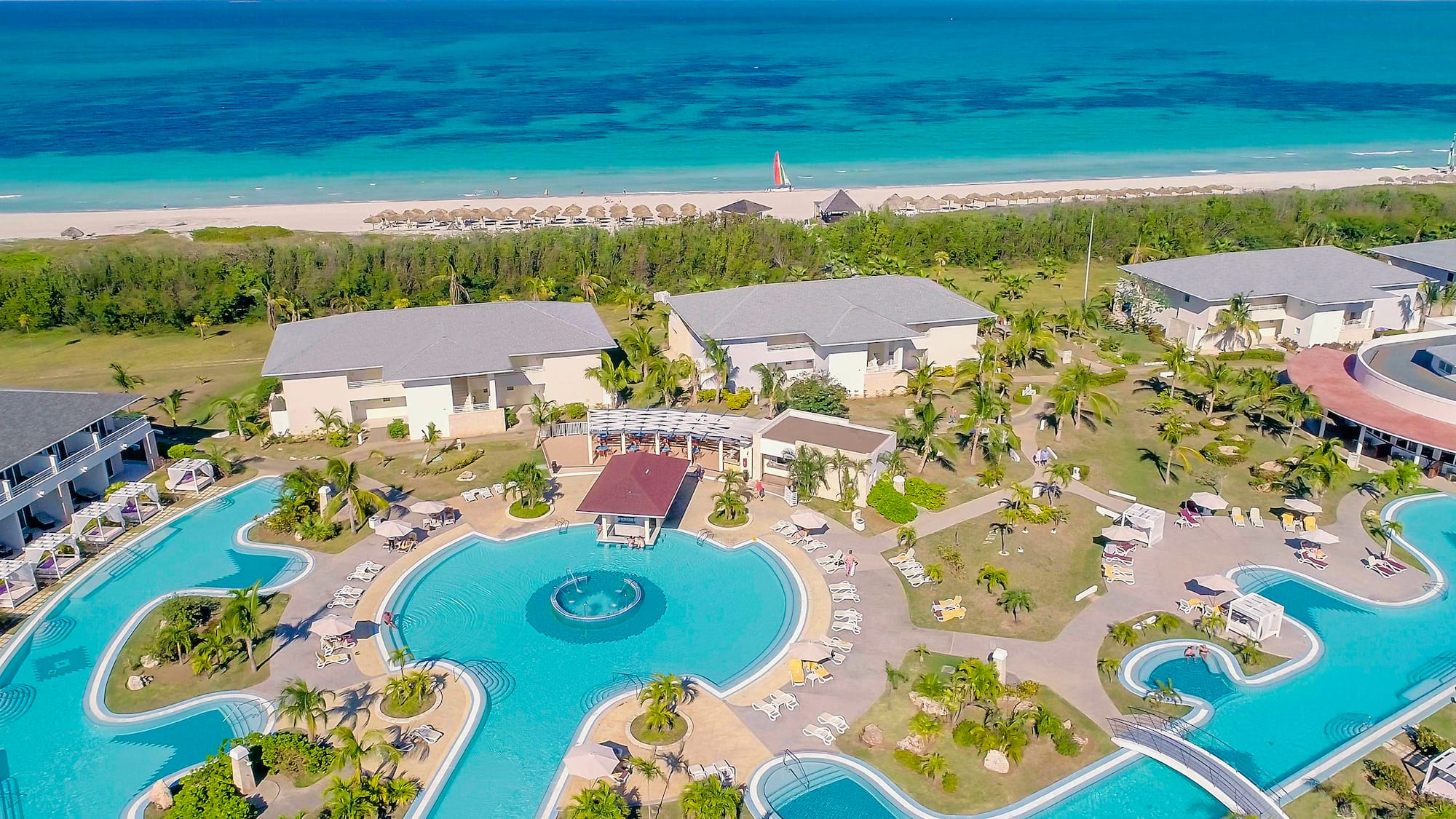 a swimming pool with a large body of water