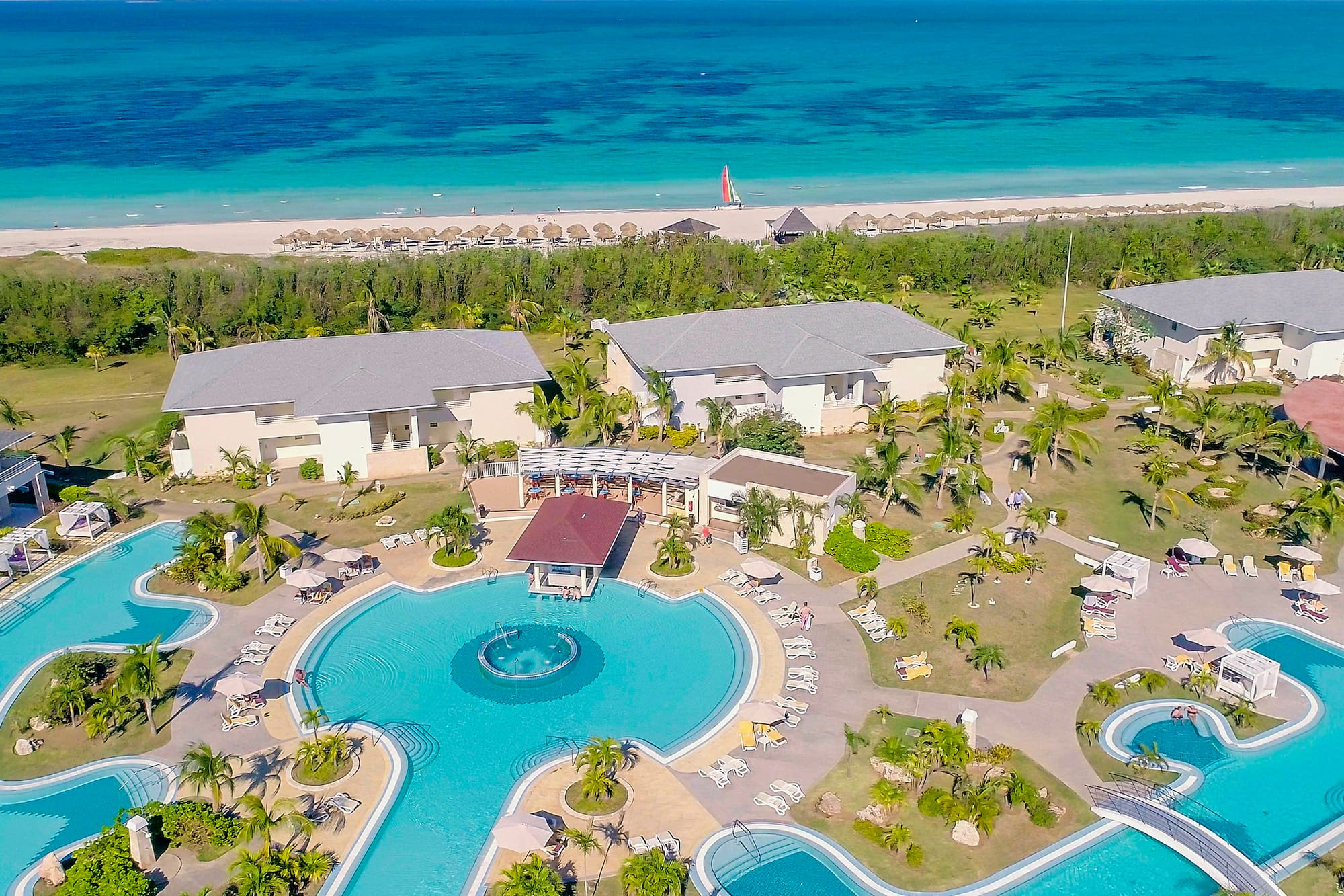 a swimming pool with a large body of water