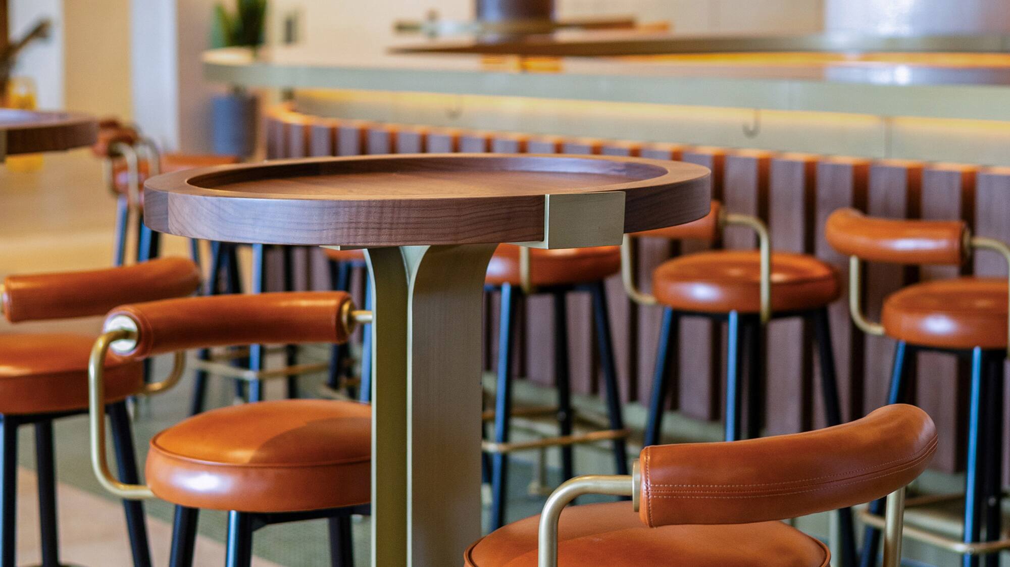 a group of chairs and a table in a room