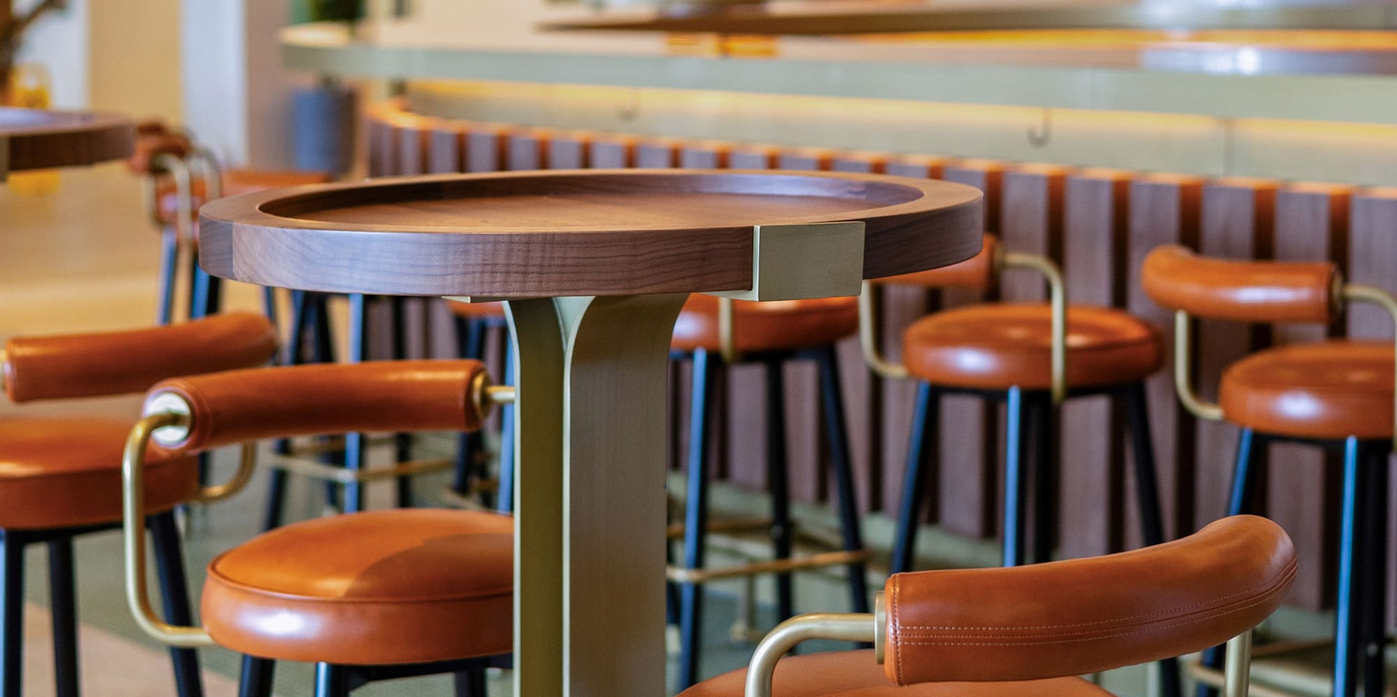 a group of chairs and a table in a room