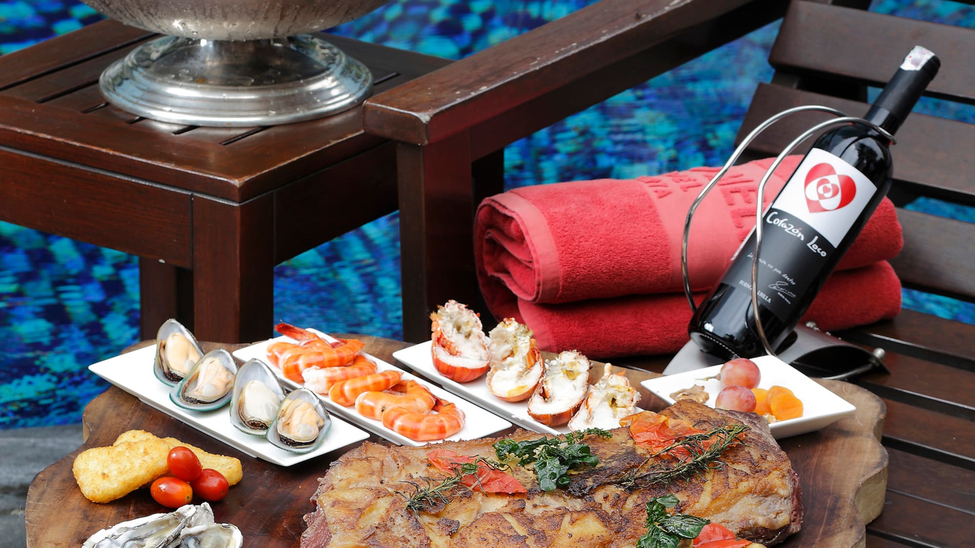 a table with food and wine bottles