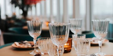 a table with plates and glasses