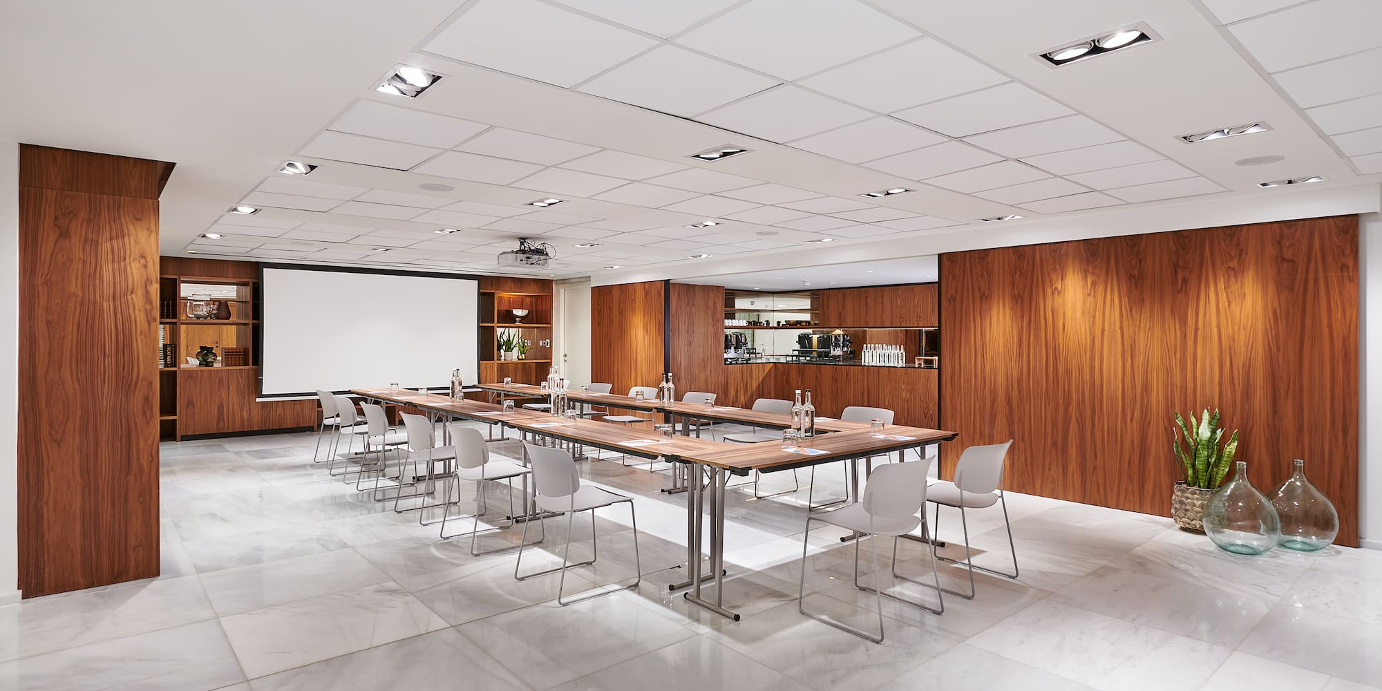 a room with a table and chairs