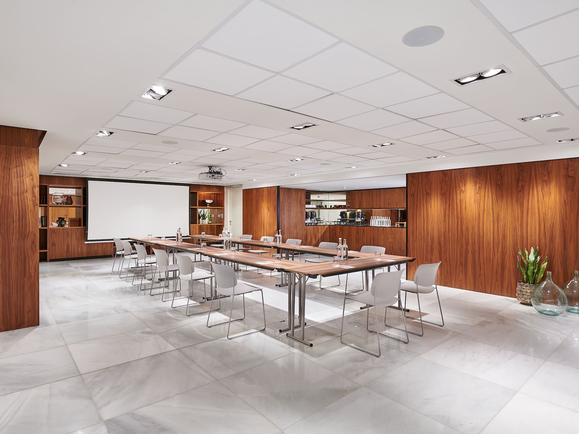 a room with a table and chairs