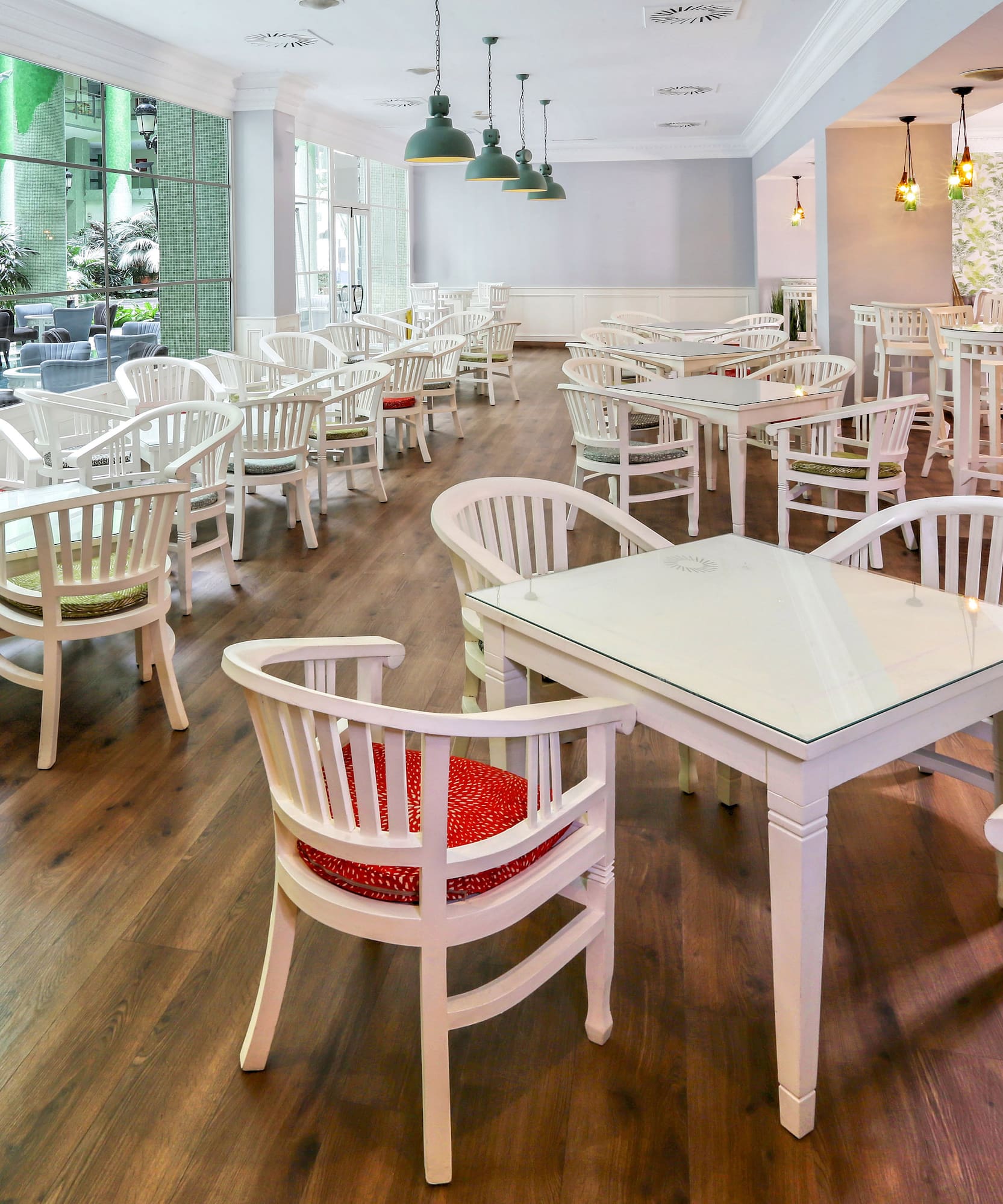 a room with tables and chairs