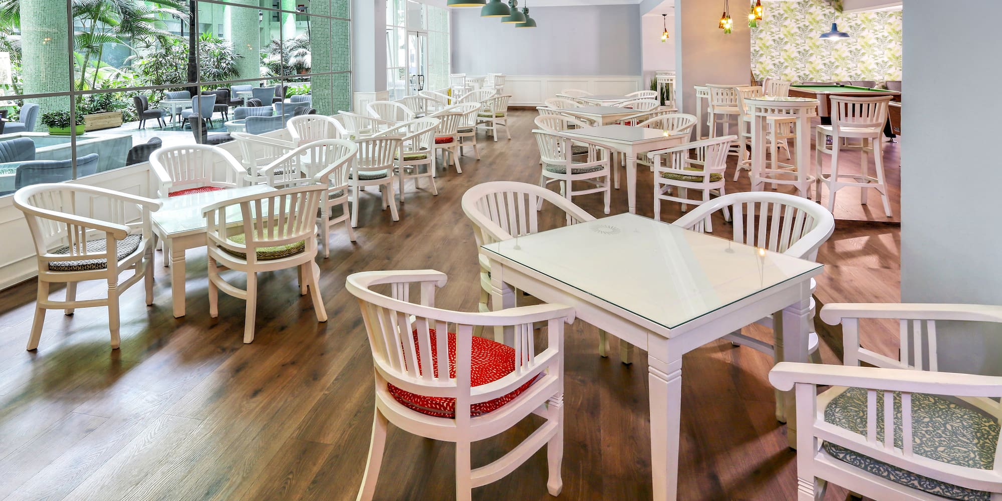 a room with tables and chairs