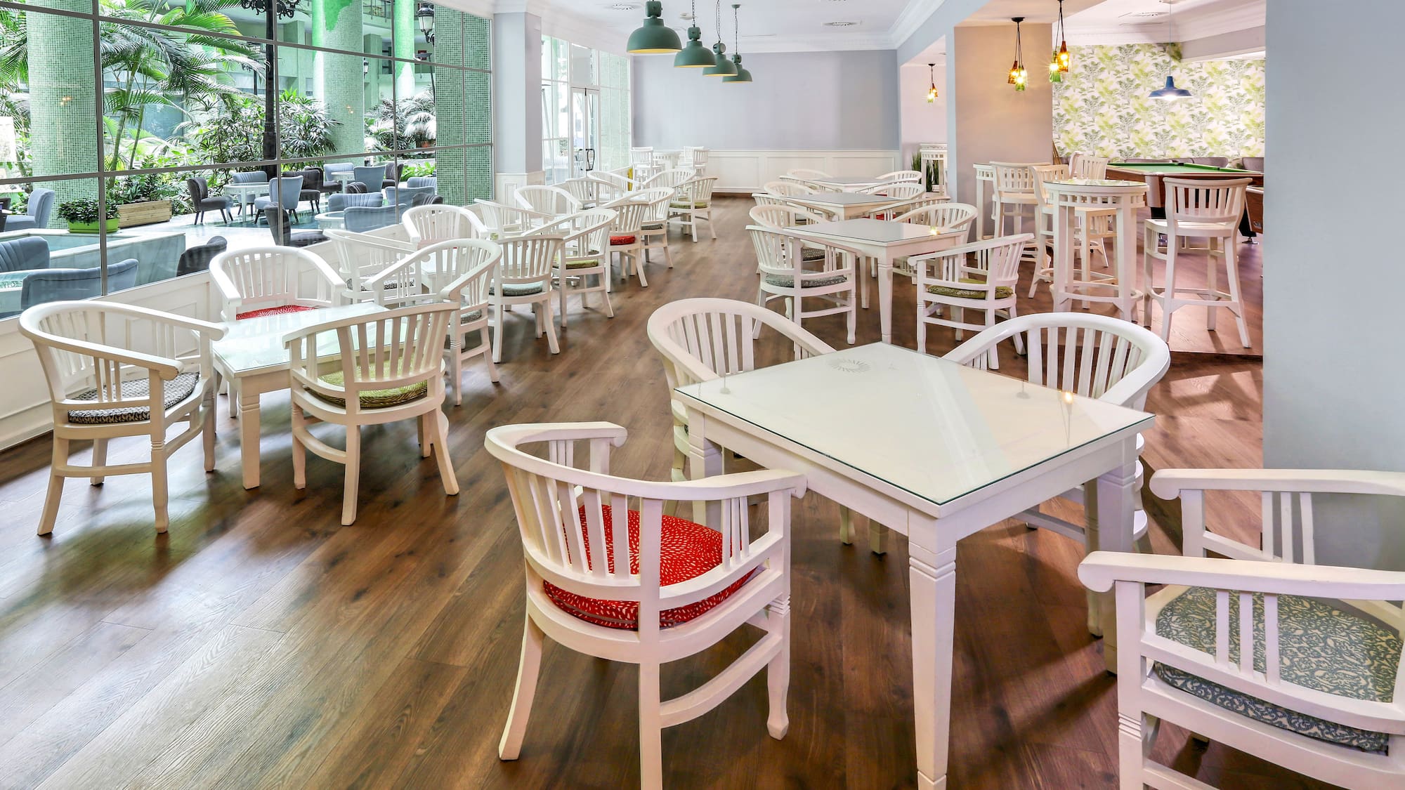 a room with tables and chairs