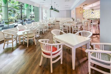 a room with tables and chairs