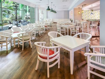 a room with tables and chairs