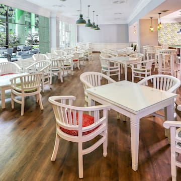 a room with tables and chairs