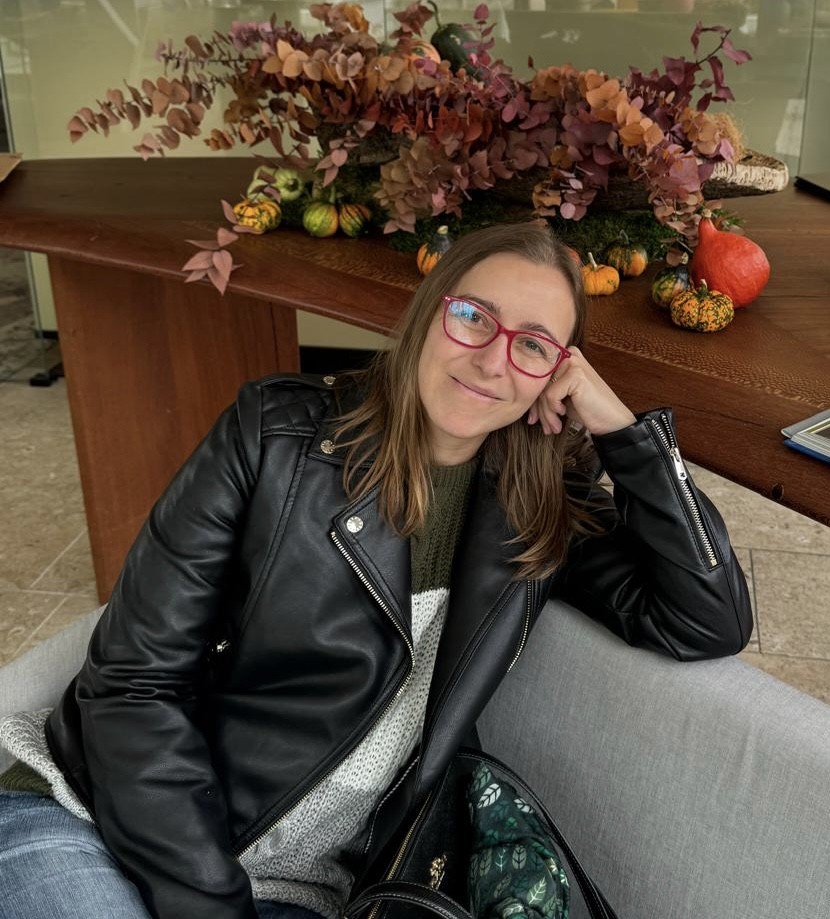 a woman sitting on a couch