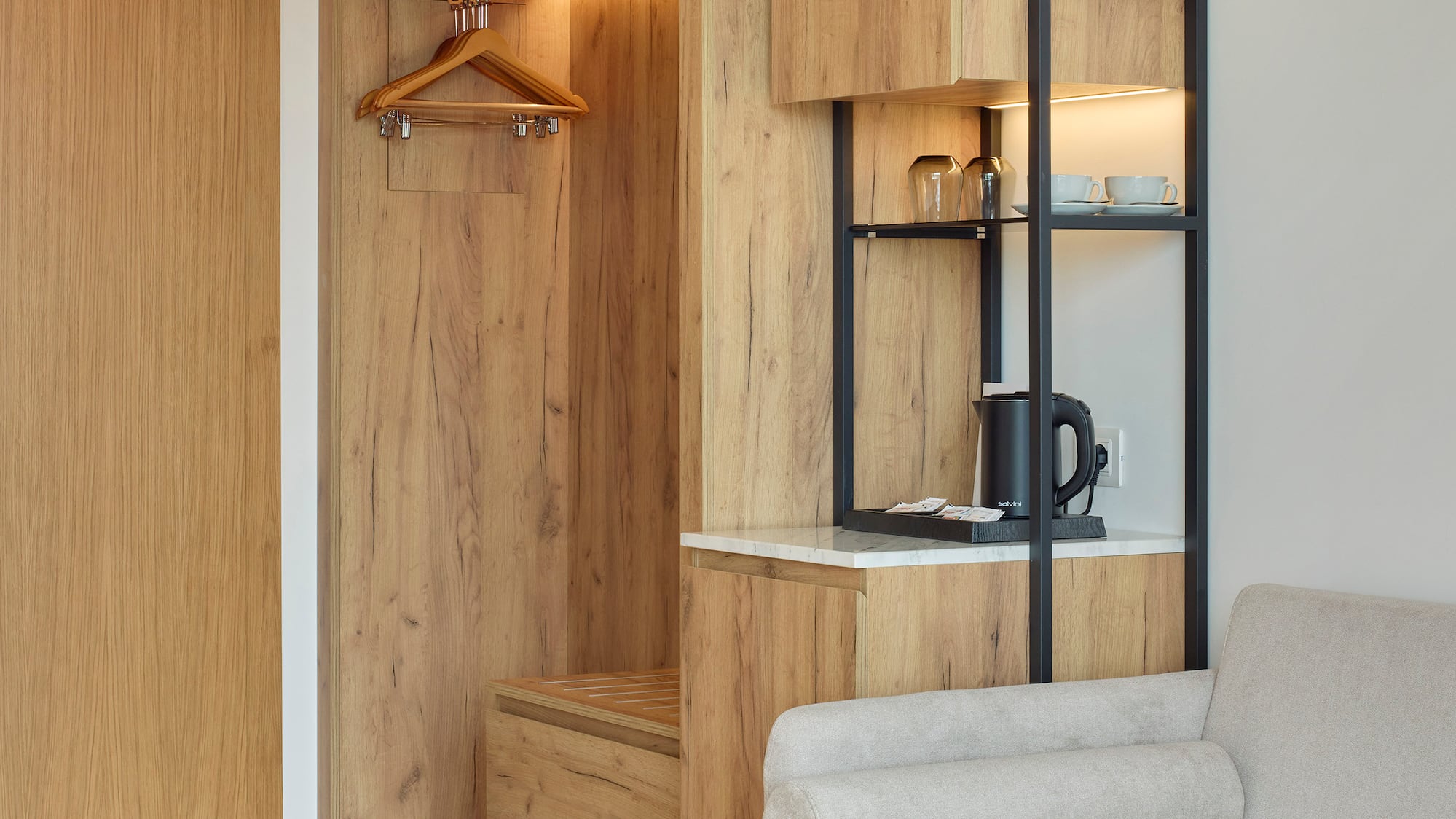 a room with a couch and a closet