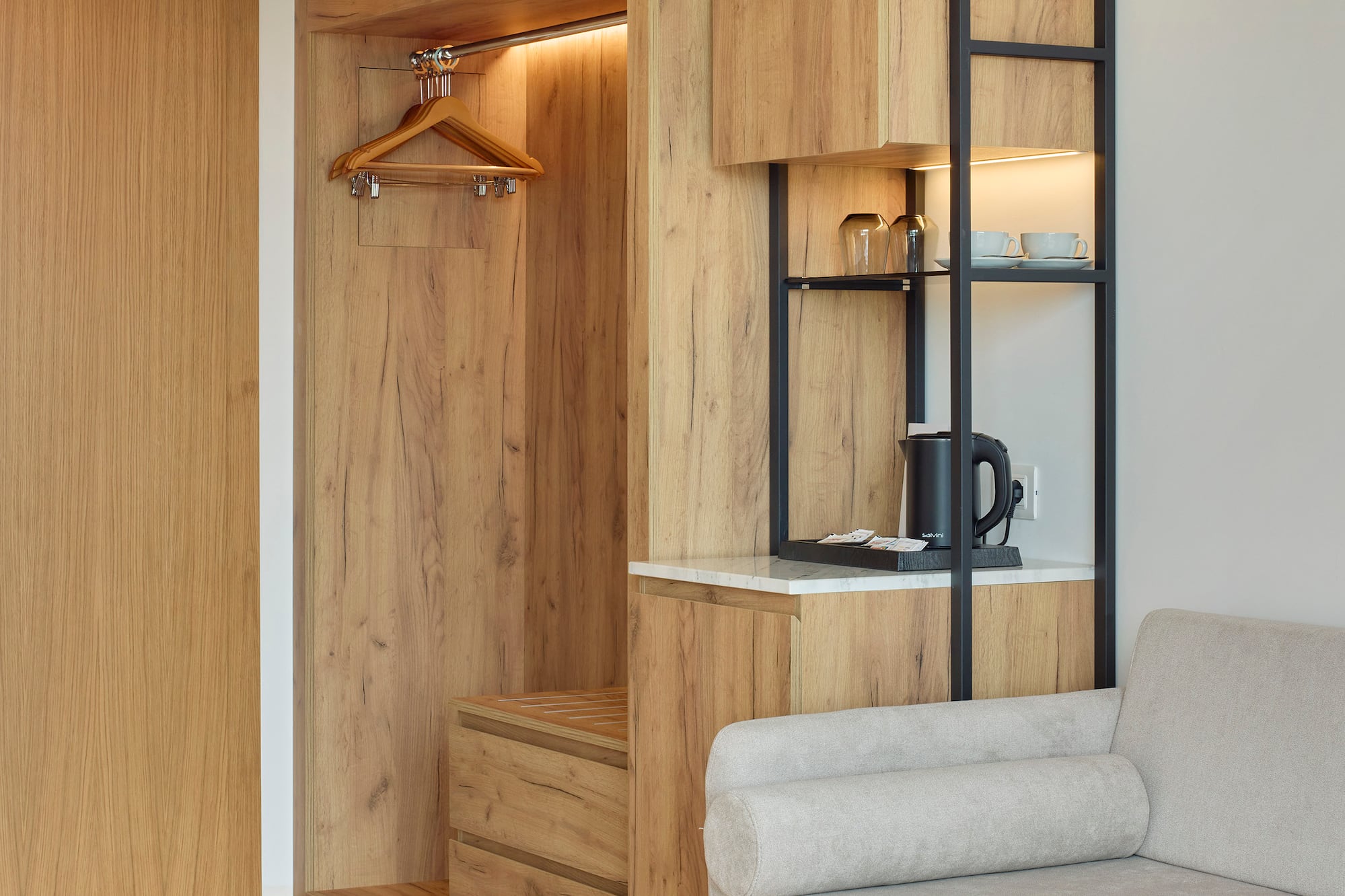 a room with a couch and a closet