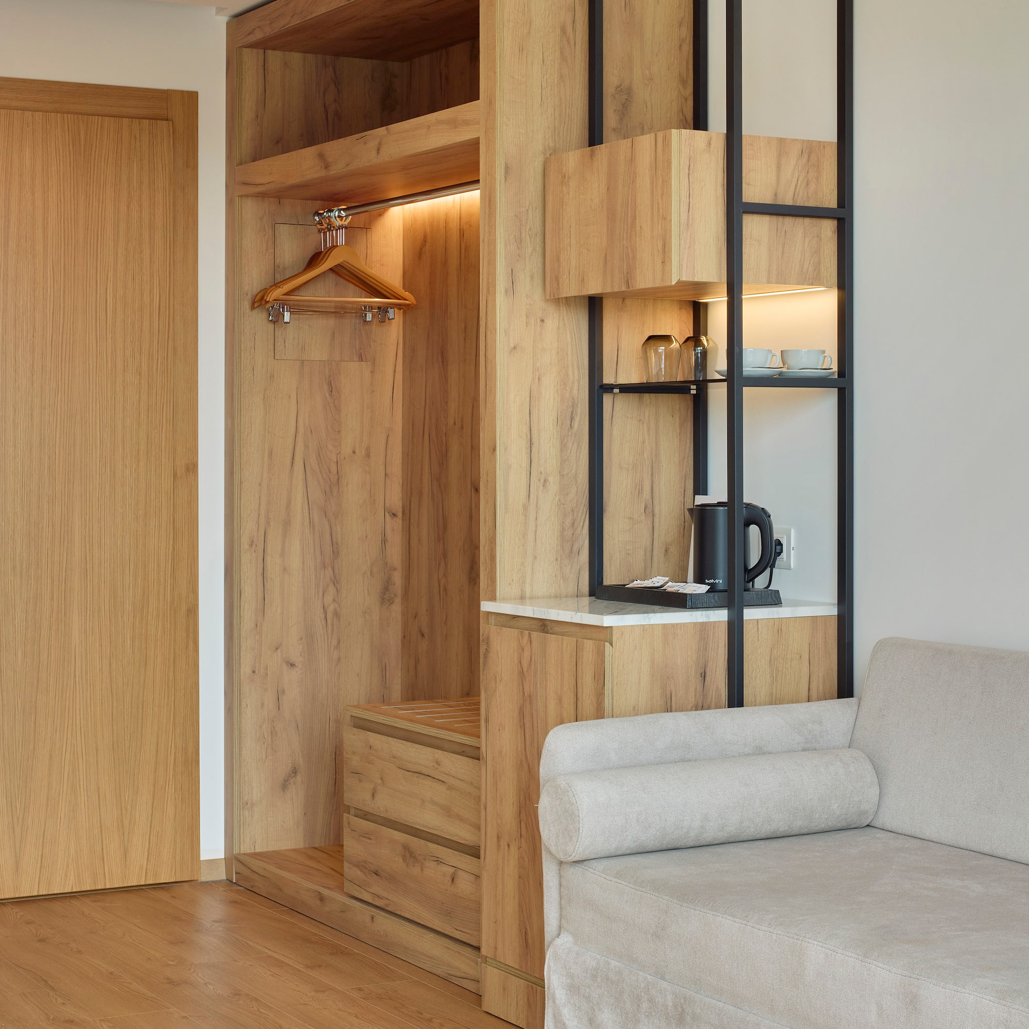 a room with a couch and a closet