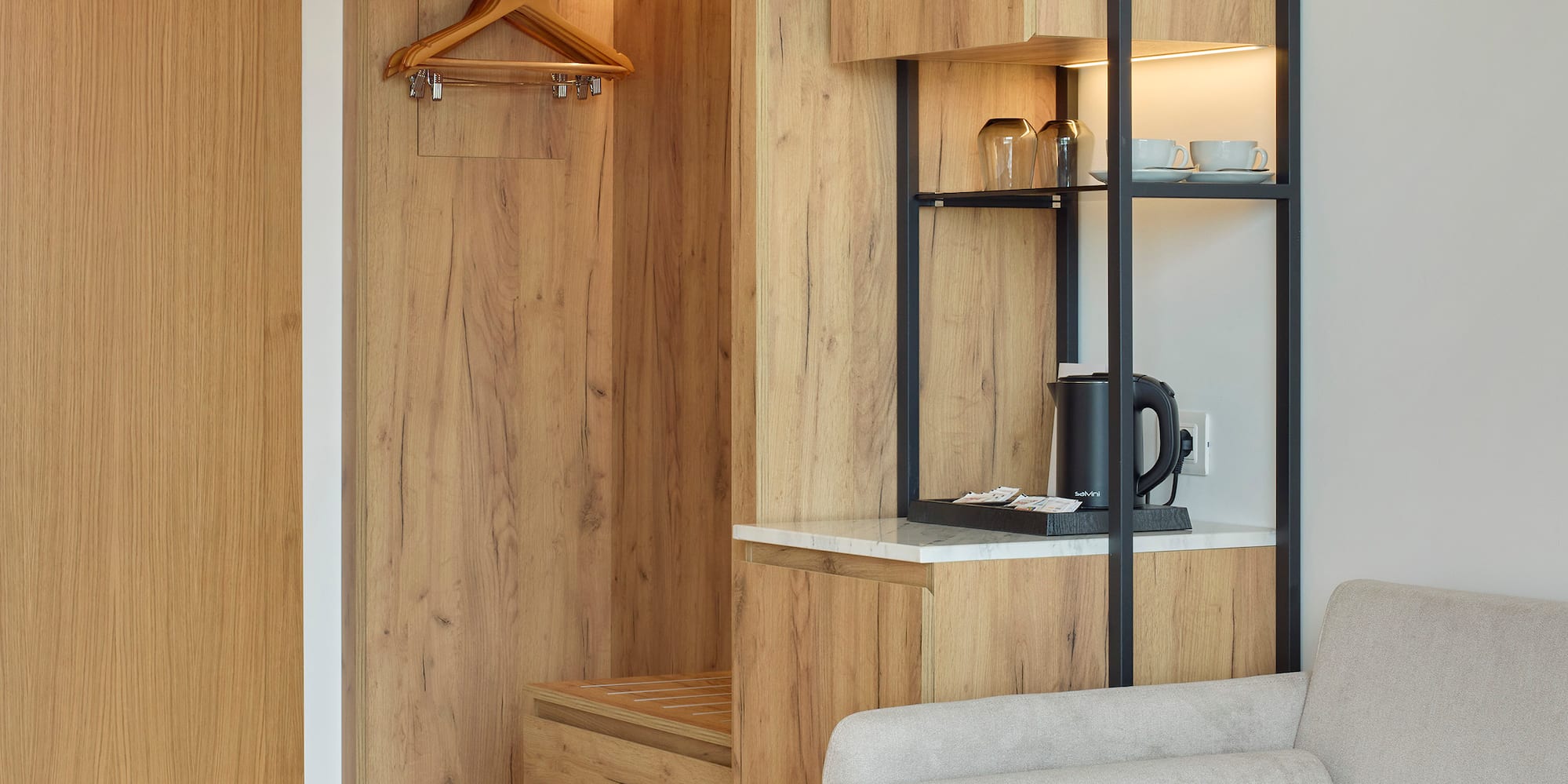 a room with a couch and a closet