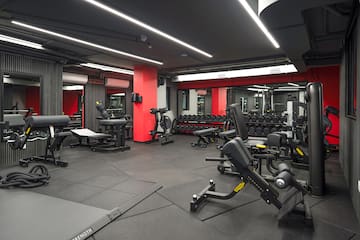 a large gym with exercise equipment