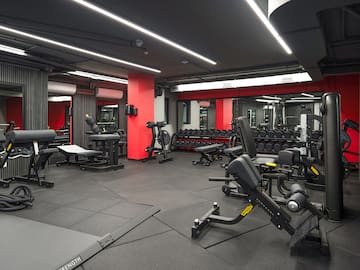 a large gym with exercise equipment