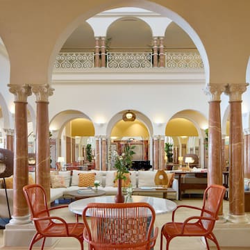 a room with a table and chairs