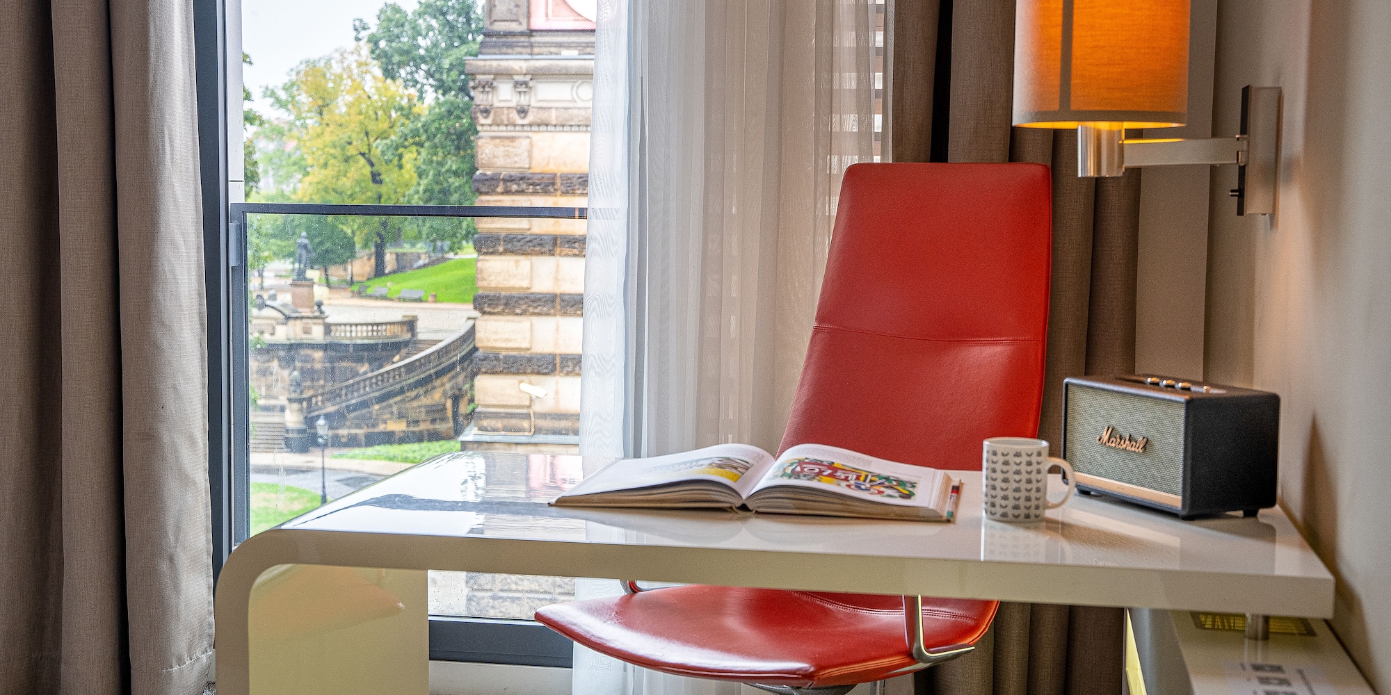 a chair and a radio on a desk