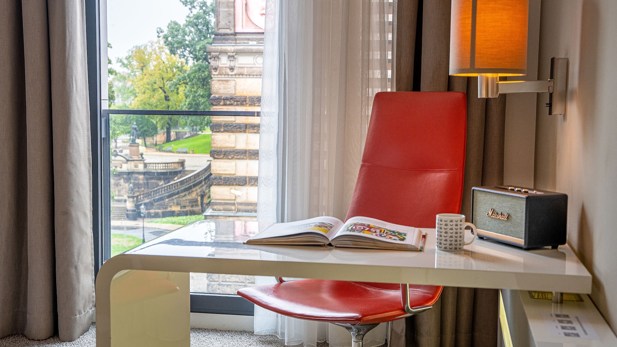 a chair and a radio on a desk