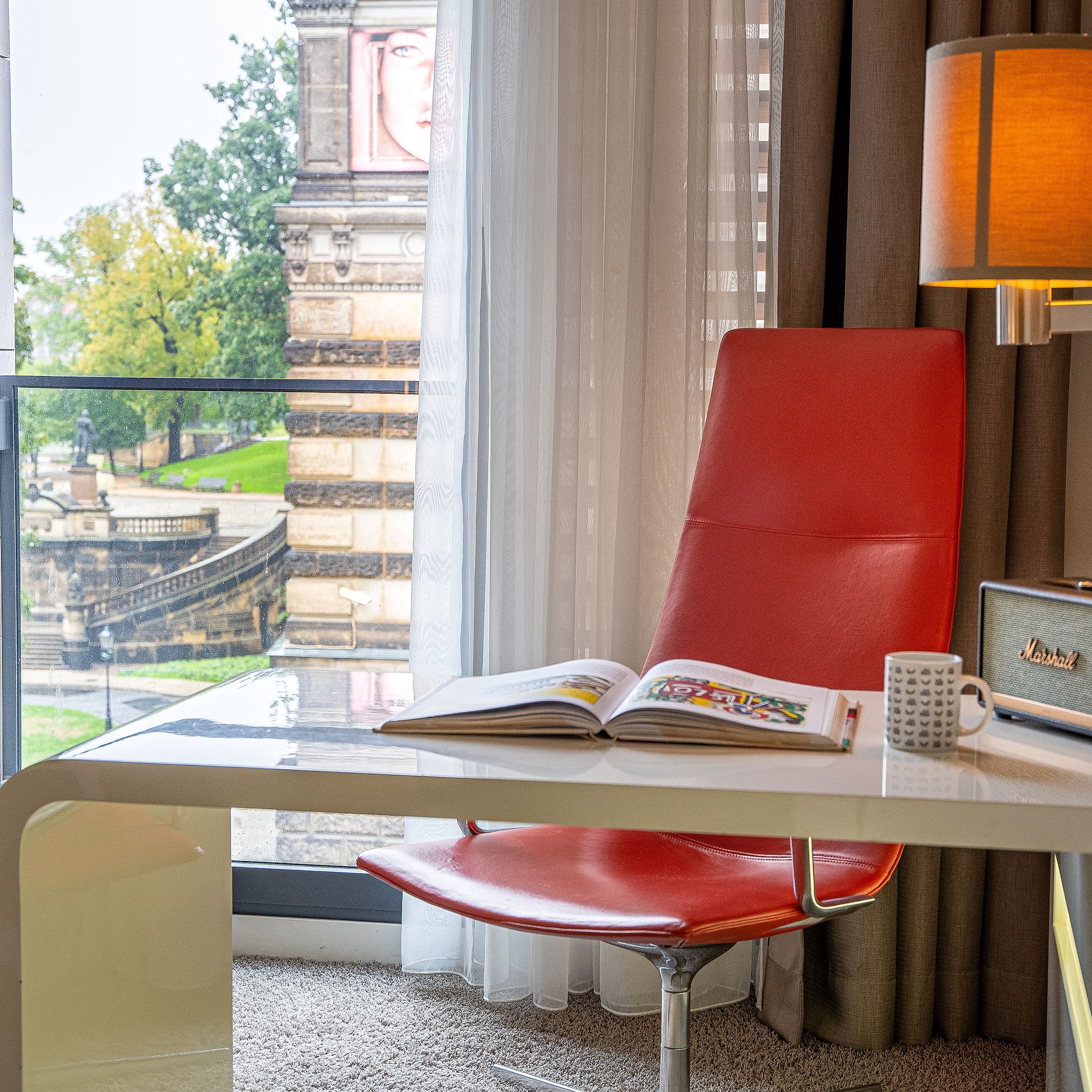 a chair and a radio on a desk