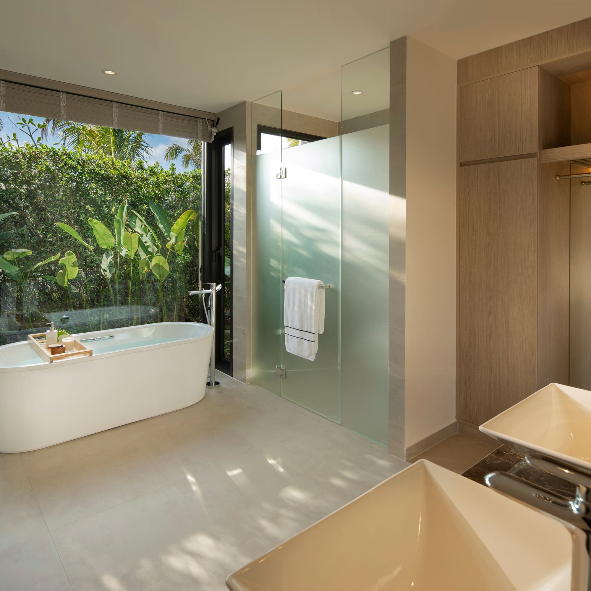 a bathroom with a tub and sink