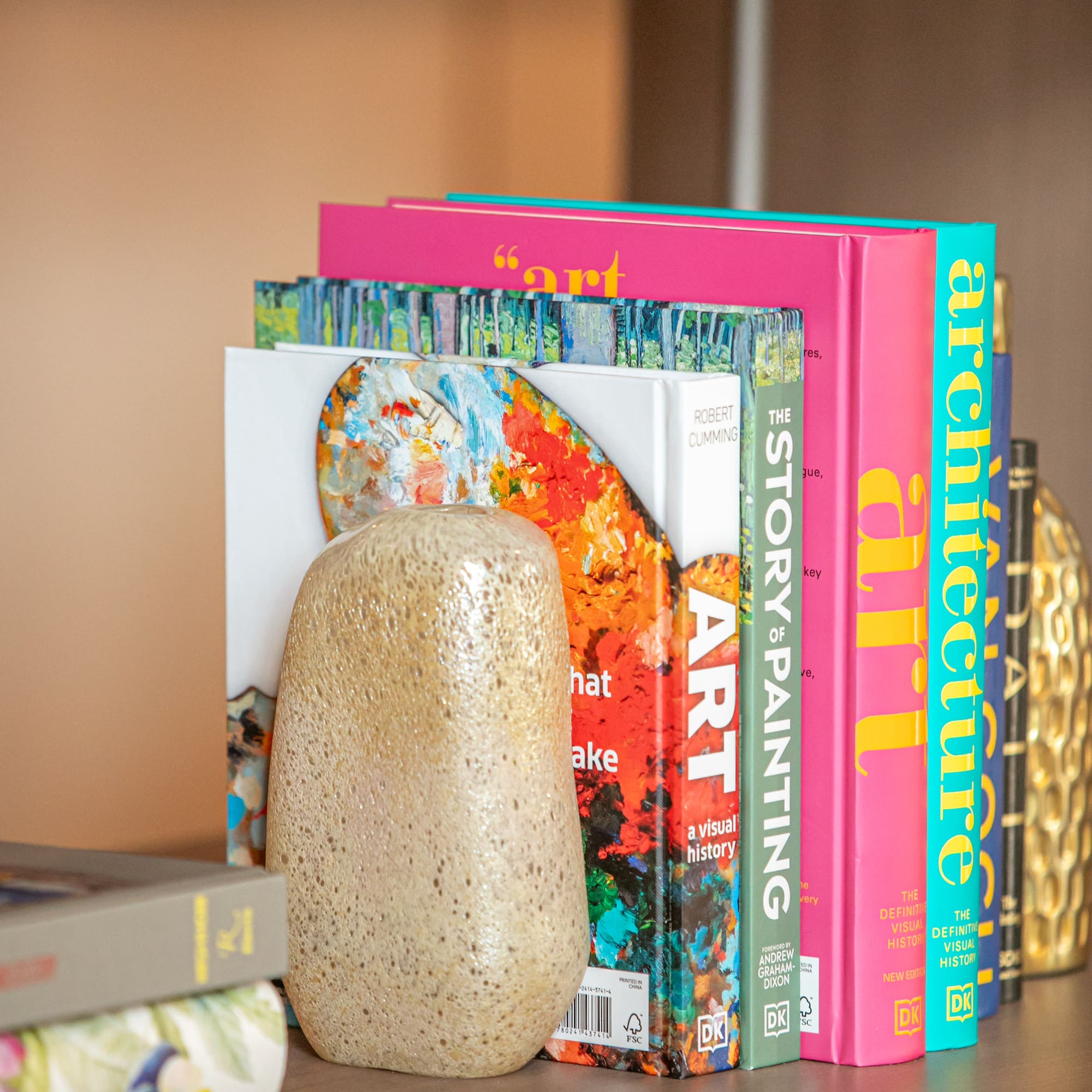 a group of books on a shelf