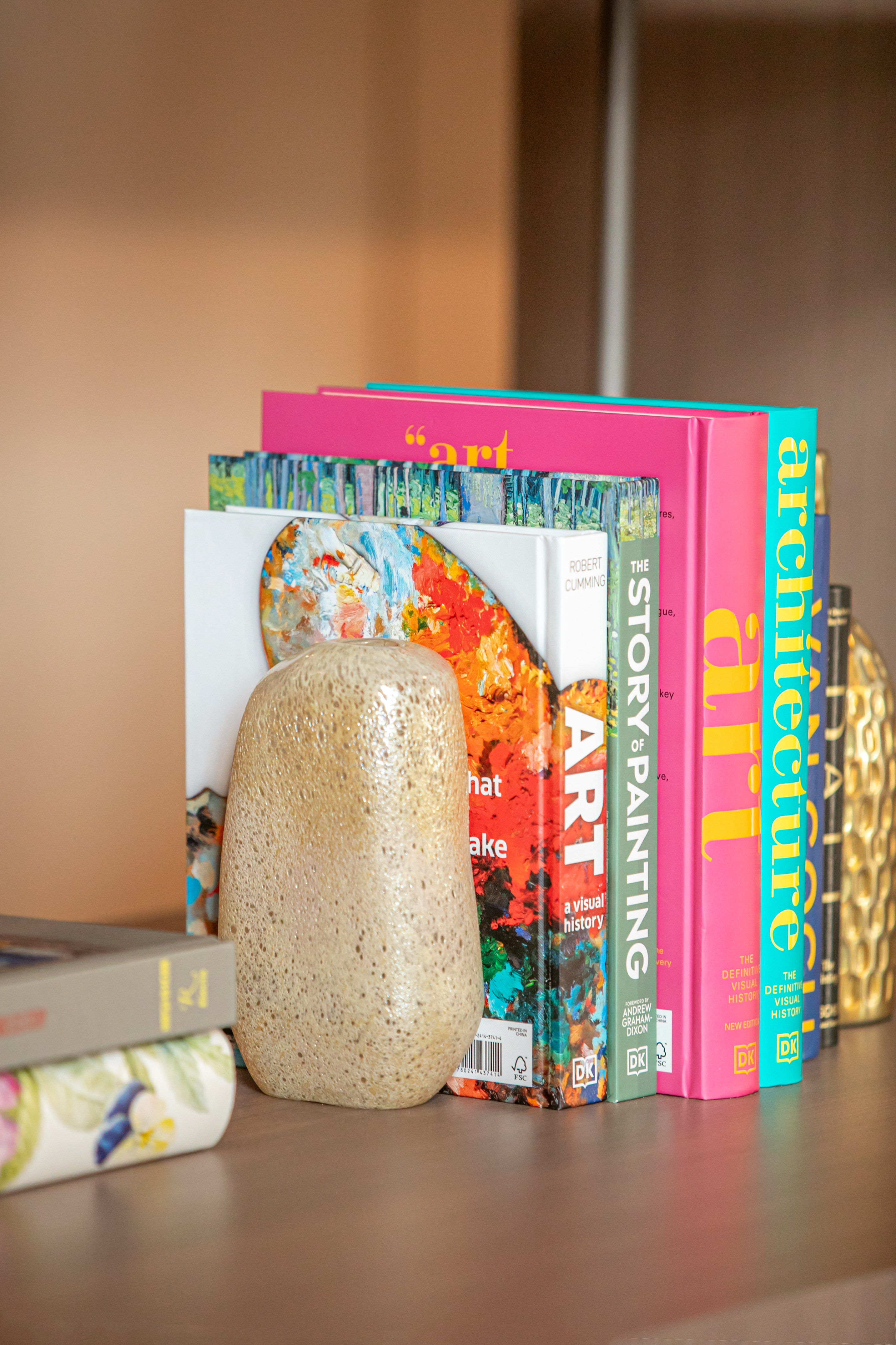 a group of books on a shelf