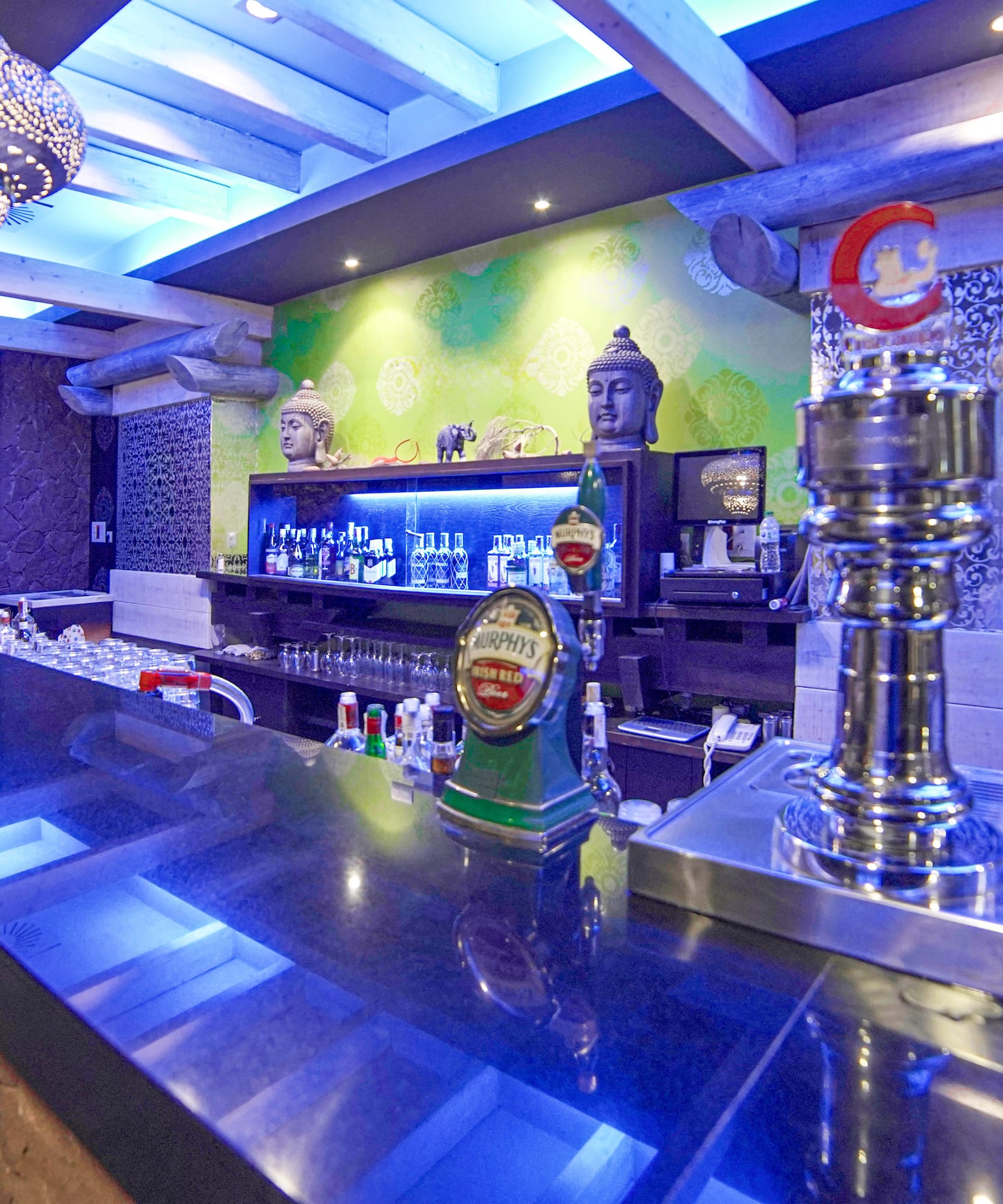 a bar with a few bottles of beer