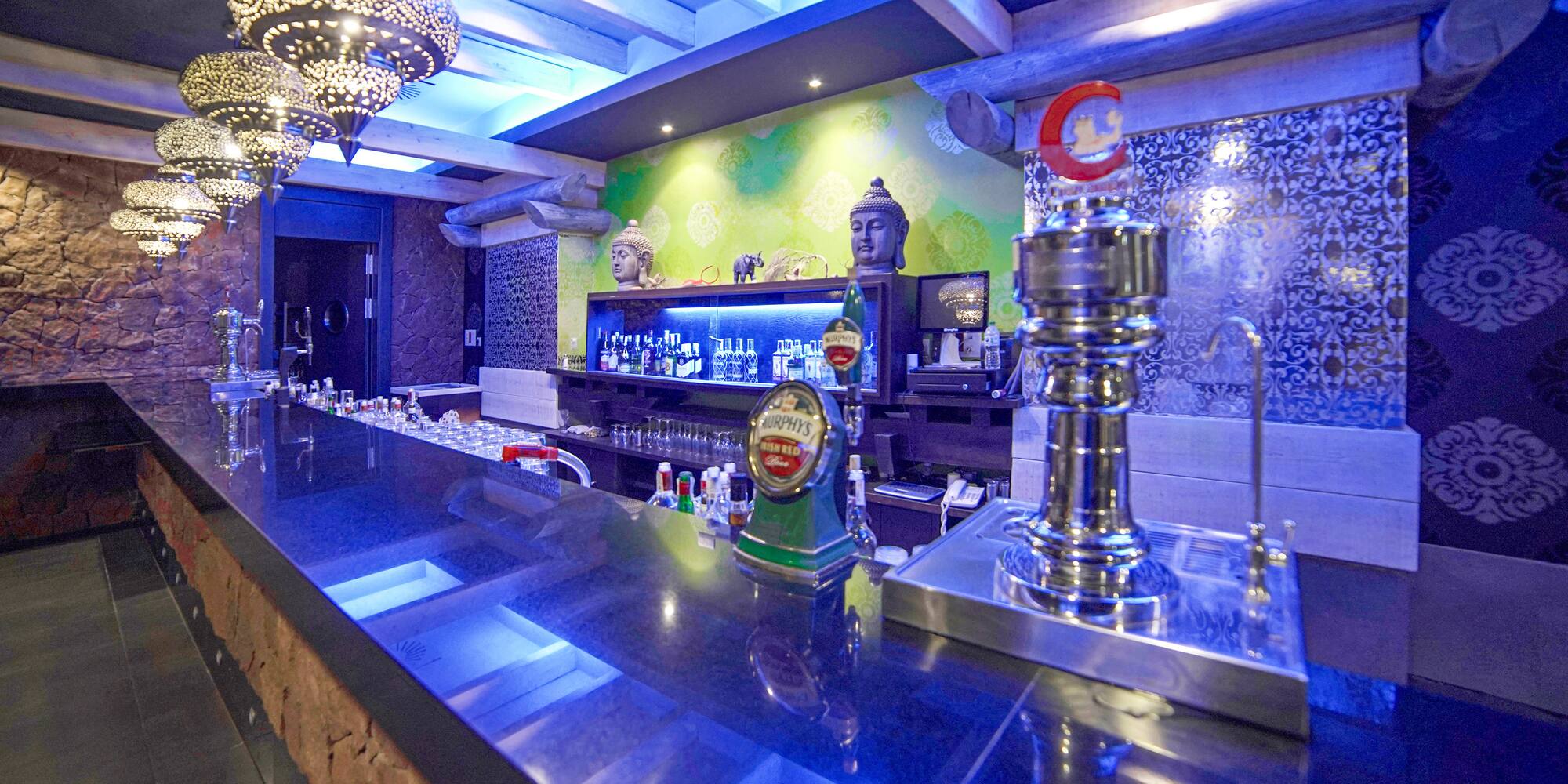 a bar with a few bottles of beer