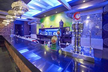 a bar with a few bottles of beer