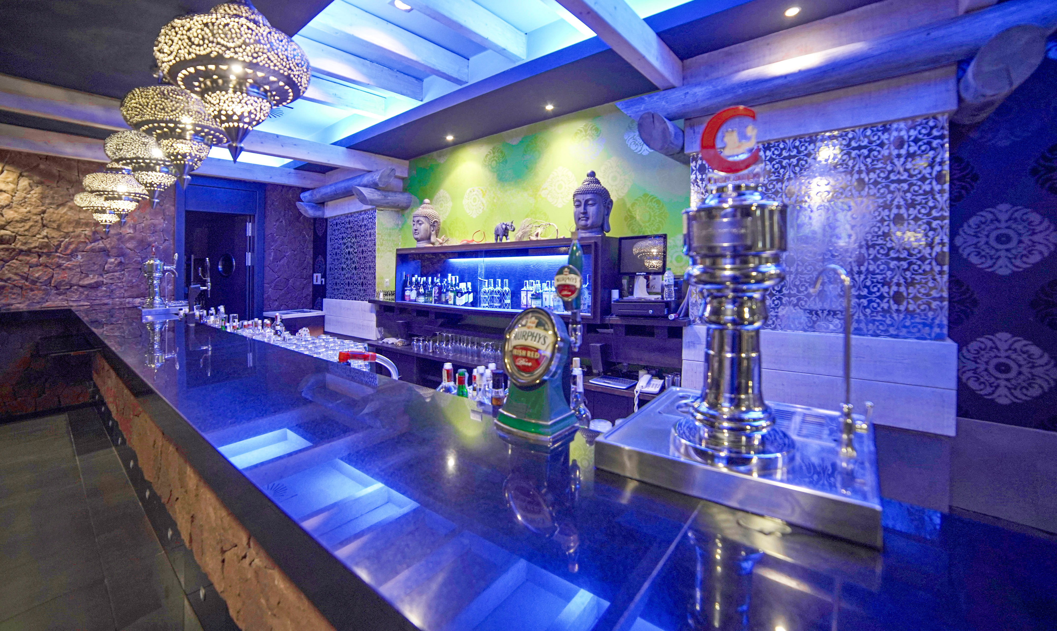 a bar with a few bottles of beer