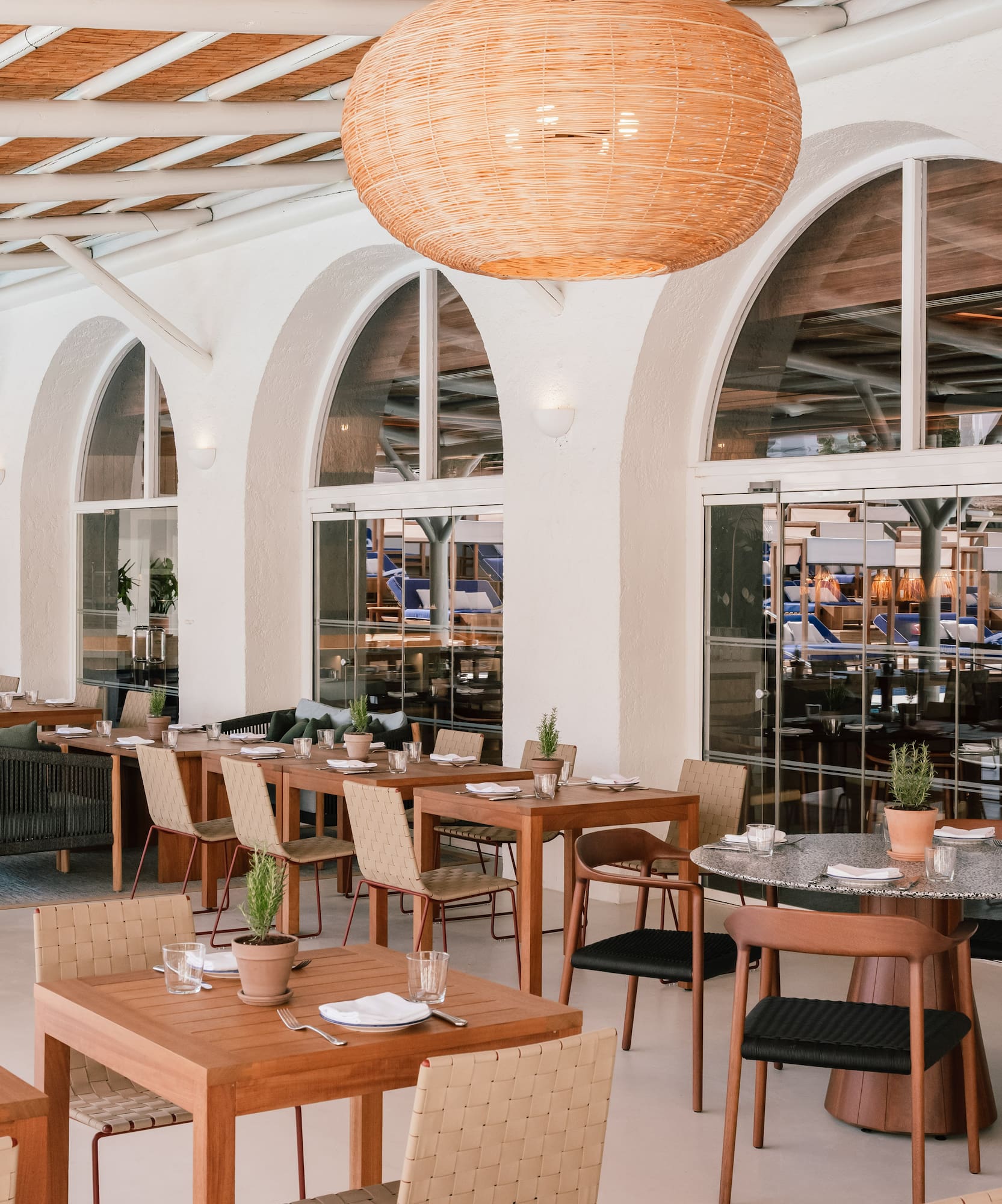 a restaurant with tables and chairs