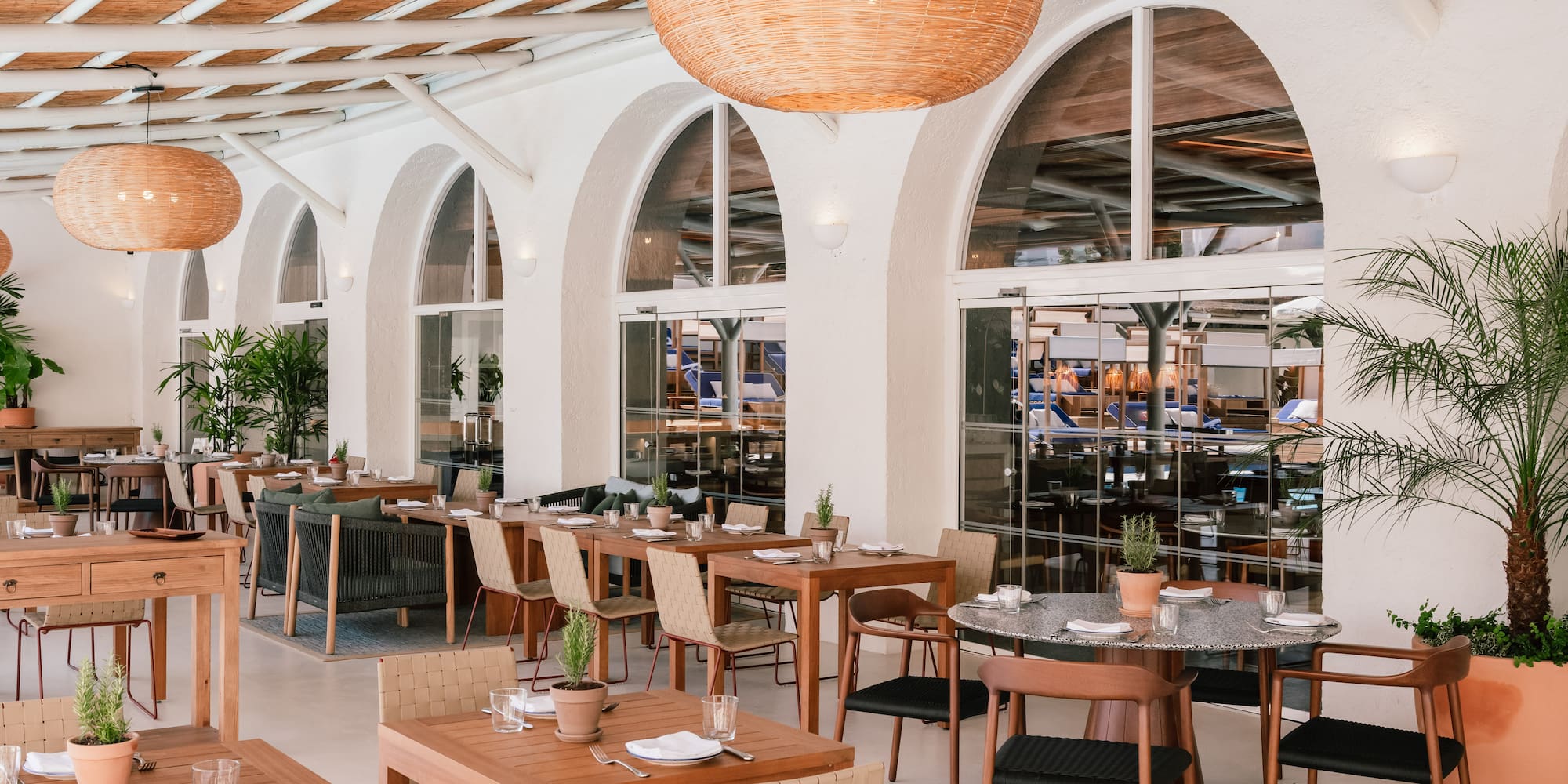 a restaurant with tables and chairs