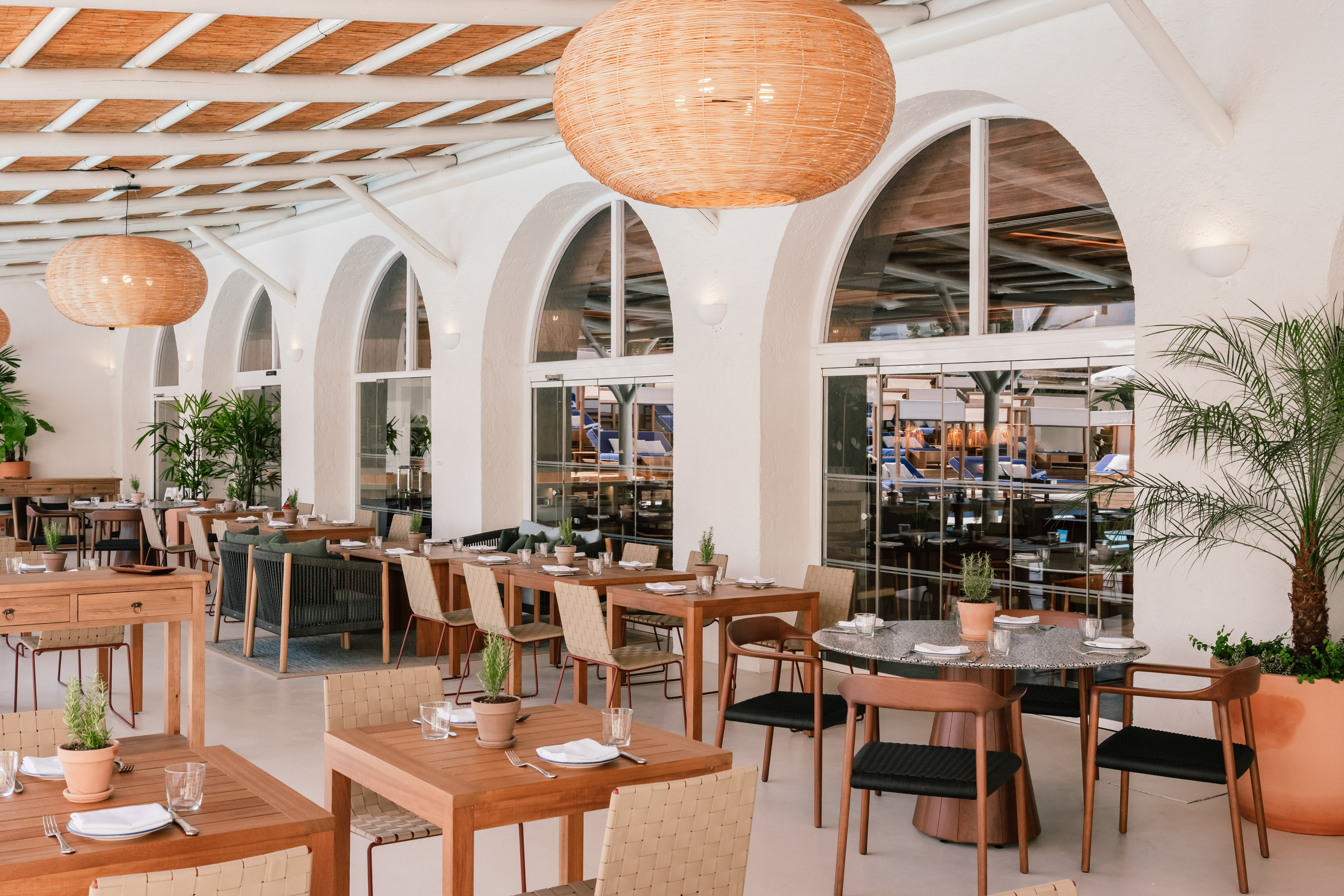 a restaurant with tables and chairs